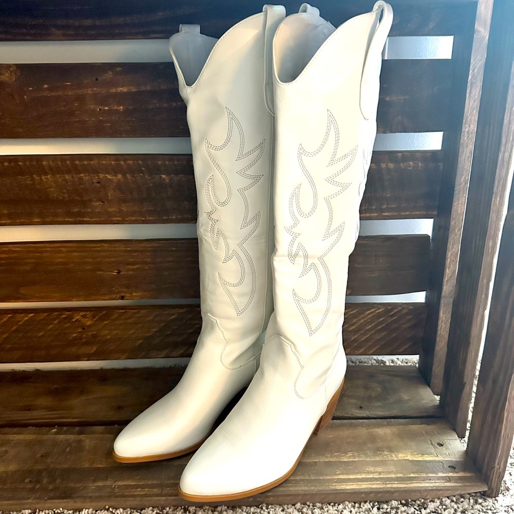 Tall white boots